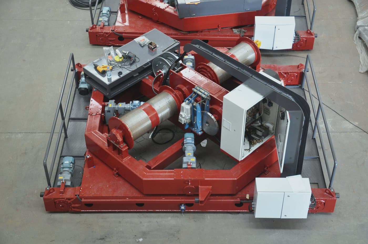 Purpose-built process trolley unit suspended under an overhead crane at the ABRA plant