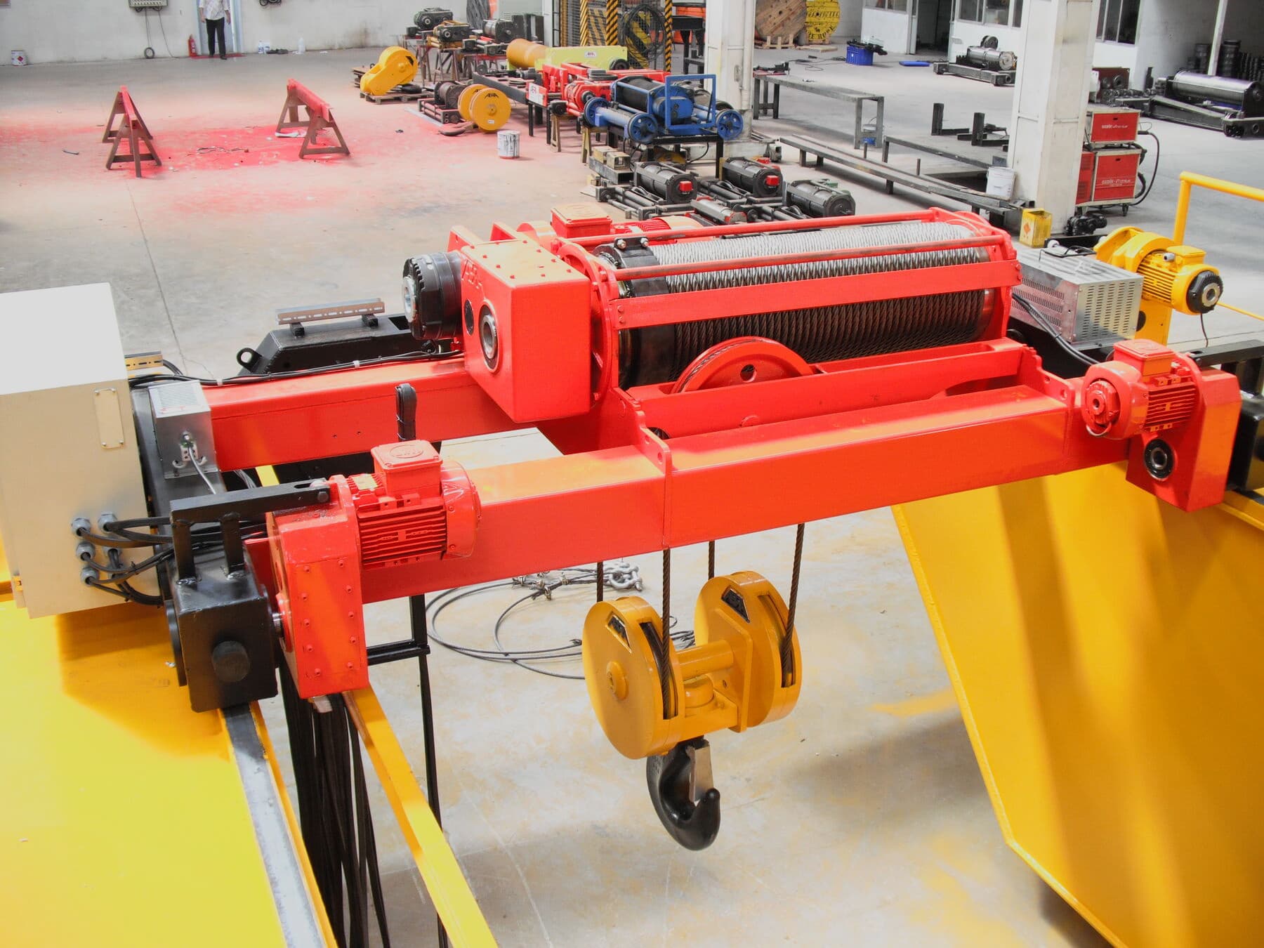 Renewed hoist and trolley unit mounted on an existing crane girder during an ABRA modernisation project