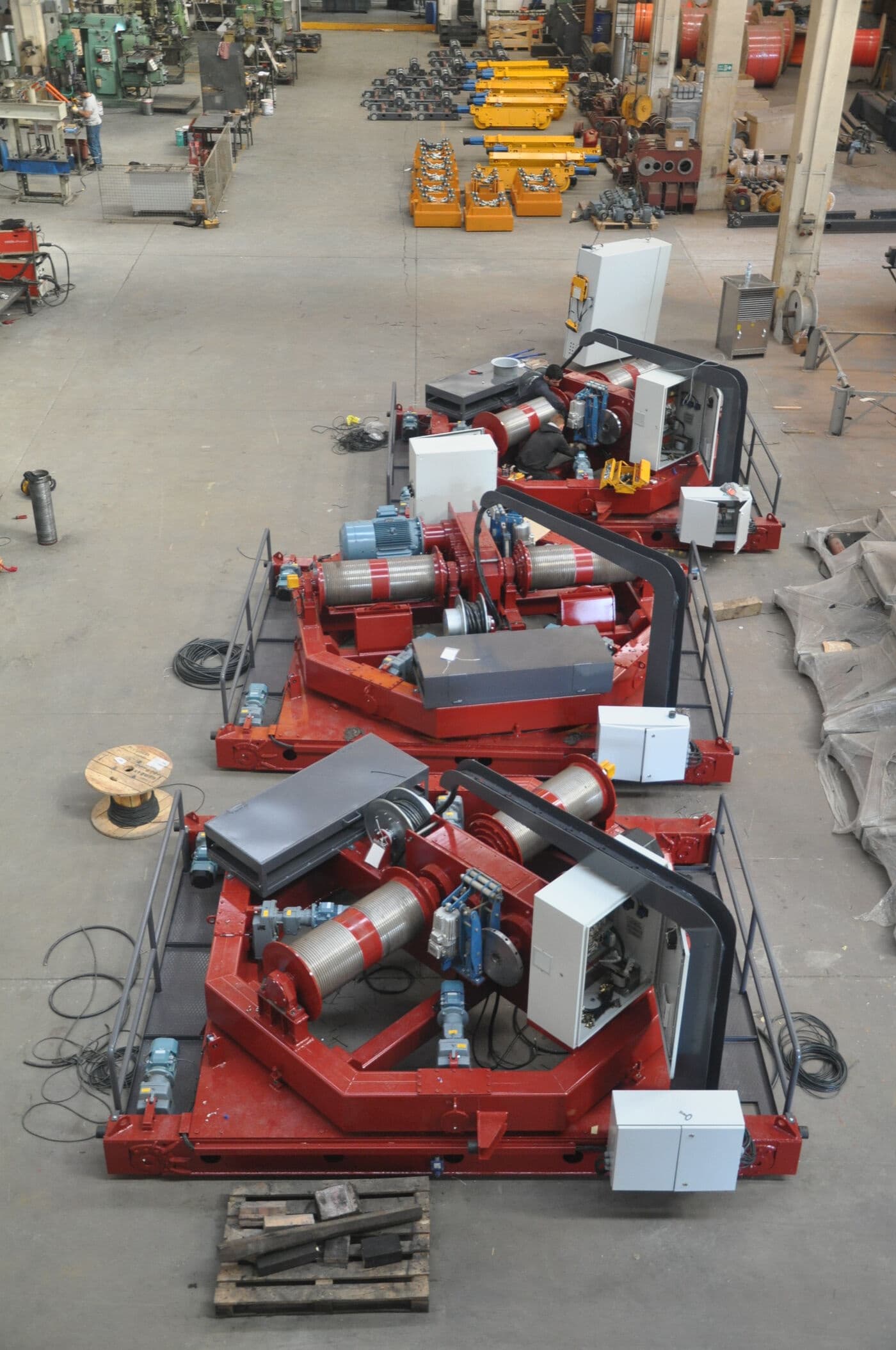 Crane drive and mechanism assemblies laid out at the ABRA plant before a modernisation rebuild