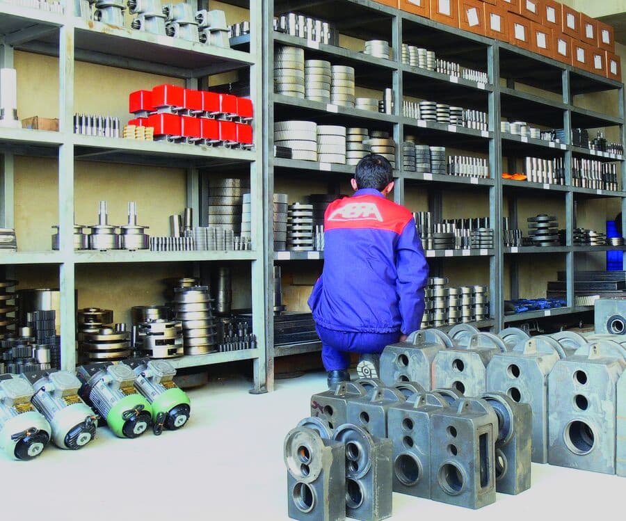 ABRA spare parts store with crane components on the shelves